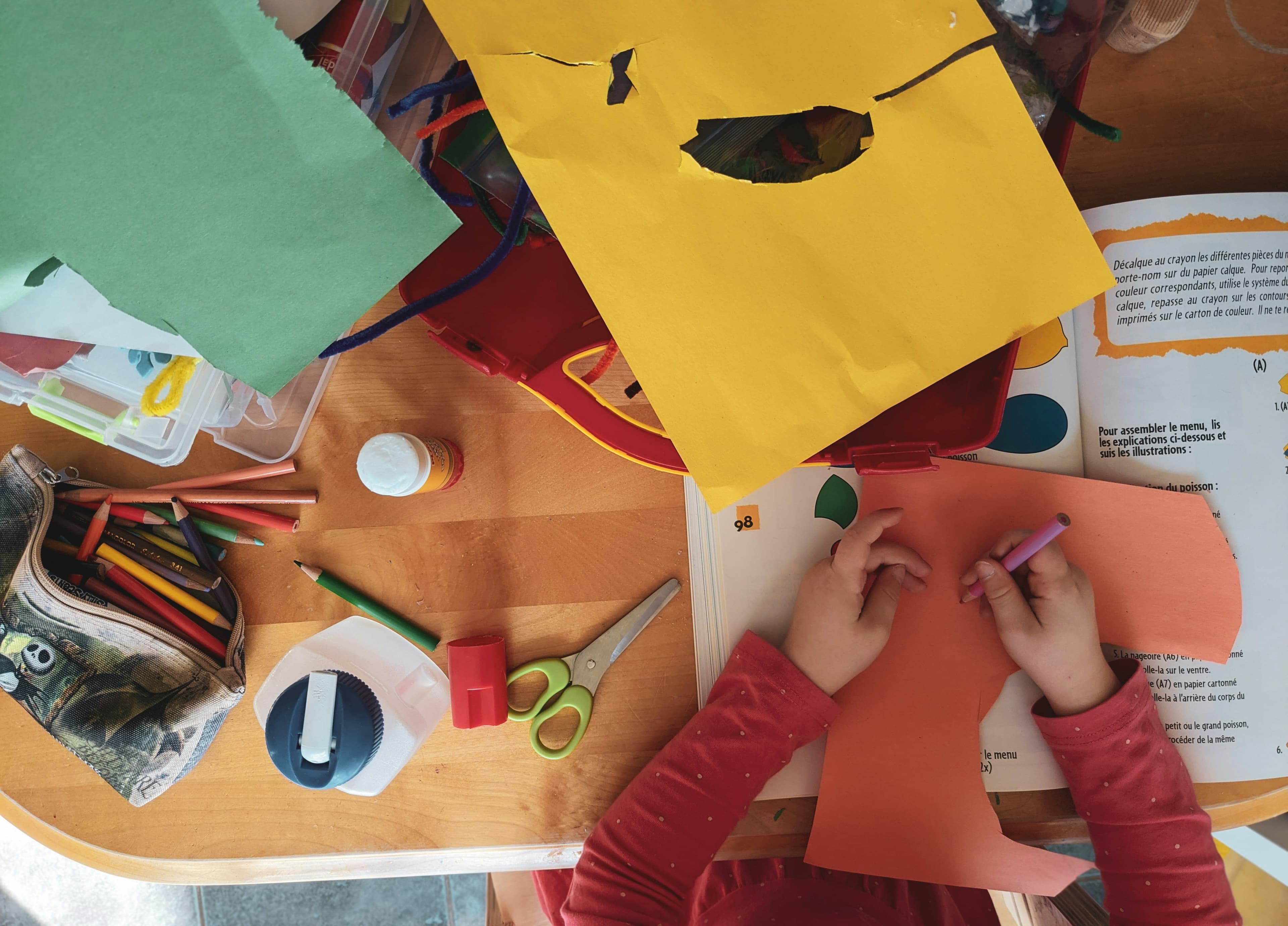 Middle grade students gathering for a creative activity